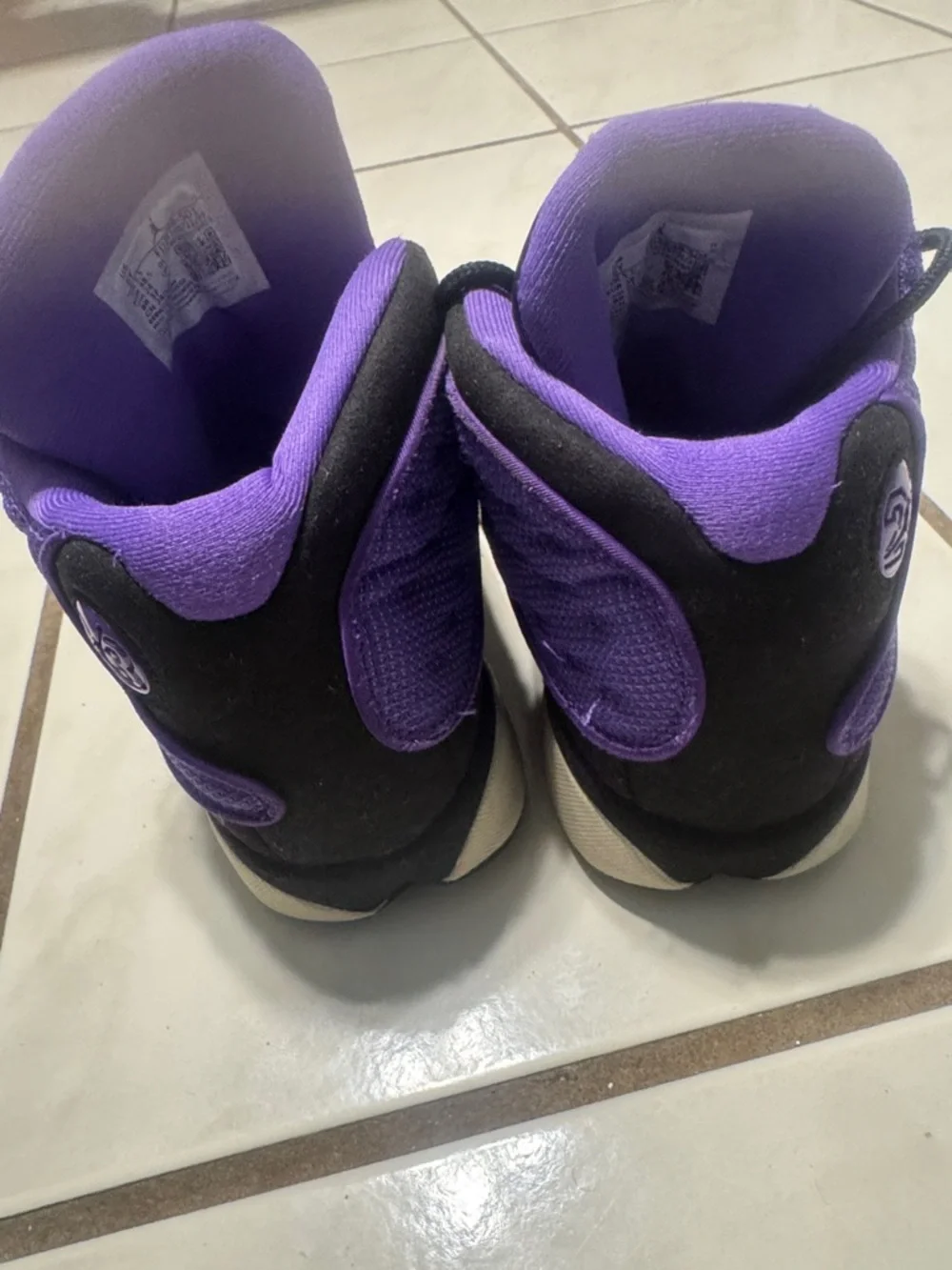 Nike unisex kids sneakers in purple and black